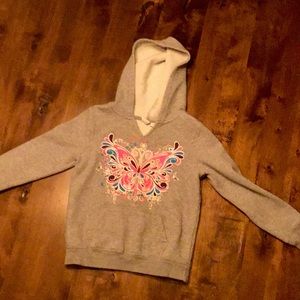 A butterfly hoodie that’s a size 5/6